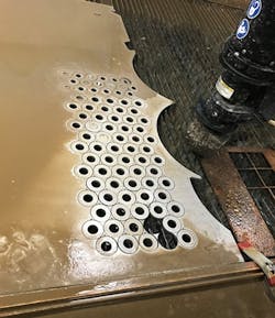 Www Americanmachinist Com Sites Americanmachinist com Files 1218 Omax Tropical J Cutting Grommets2 400 Www Americanmachinist Com Sites Americanmachinist com Files 1218 Omax Tropical J Cutting Grommets2 400