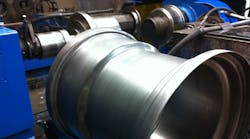 Spin forming transforms cylindrical workpieces into seamless wheel rims Spin forming transforms cylindrical workpieces into seamless wheel rims