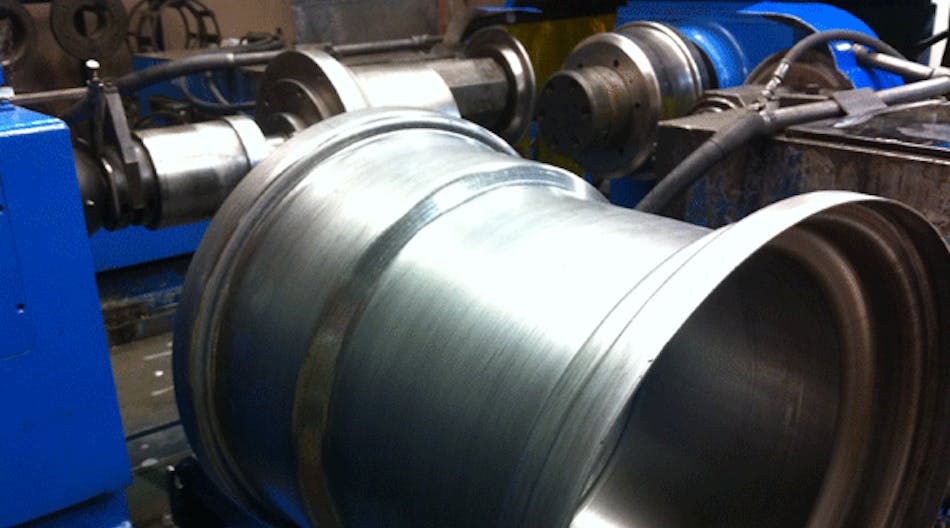 Spin forming transforms cylindrical workpieces into seamless wheel rims.