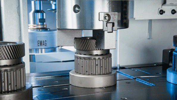 VLC 100 G vertical pickup grinder has three axes X Z C and uses its overhead pickup spindle to load itself It machines with one or two grinding spindles for internal andor external work Workpieces are mounted on pallets and fed into the VLC 100 G by conveyor belt Then the pickup spindle continues the automated loading and unloading process