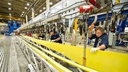 Boeing mechanics assembly spars for the NextGeneration 737 at the jetbuilderrsquos Renton Wash plant Boeing mechanics assembly spars for the NextGeneration 737 at the jetbuilderrsquos Renton Wash plant
