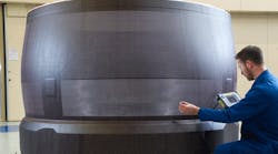 A carbon composite inner skin for the LEAP-1C engine’s O-Duct is formed via a specialty molding process, used for the first time in the program to build aero-structures for the CFM International turbofan engine. A carbon composite inner skin for the LEAP-1C engine’s O-Duct is formed via a specialty molding process, used for the first time in the program to build aero-structures for the CFM International turbofan engine.