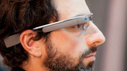 Google co-founder Sergey Brin models the Google Glass, which precision machine shop ITAMCO is coordinating with MTConnect for a scalable, functional process data management application.