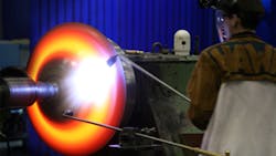 Metal spinning involves a disc revolving at controlled speeds on a lathelike machine with a spinning mandrel imparting the shape of the finished design The finished parts are able to be used in place of welded or fabricated shapes Metal spinning involves a disc revolving at controlled speeds on a lathelike machine with a spinning mandrel imparting the shape of the finished design The finished parts are able to be used in place of welded or fabricated shapes