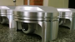 Pistons machined from a specialty aluminum alloy on the venture&rsquo;s new GF Mikron machining centers.
