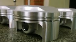 Pistons machined from a specialty aluminum alloy on the venturersquos new GF Mikron machining centers Pistons machined from a specialty aluminum alloy on the venturersquos new GF Mikron machining centers