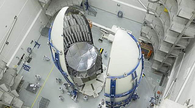 At Astrotech Space Operations at Cape Canaveral, the U.S. Navy&apos;s MUOS-2 satellite is encapsulated in a protective fairing as launch preparations proceed.