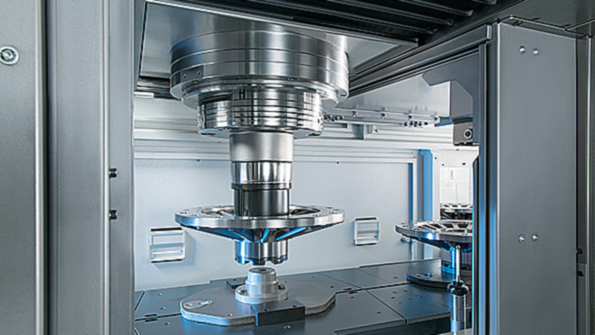 Workpieces are transported to the pickup station in flexible carrier prisms mounted on the conveyor belt making resetting efforts to accommodate workpiece diameter changes minimal