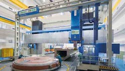 A movinggantry milling machine built by Pietro Carnaghi spa a UCIMU member company that also designs and builds vertical lathes A movinggantry milling machine built by Pietro Carnaghi spa a UCIMU member company that also designs and builds vertical lathes
