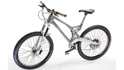 The finished mountain bike with a frame assembled from titanium parts produced by additive manufacturing The finished mountain bike with a frame assembled from titanium parts produced by additive manufacturing