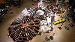 Lockheed Martin engineers and technicians are seen testing the deployment of the InSight lander&rsquo;s solar arrays. This configuration is how the spacecraft will look on the surface of Mars.