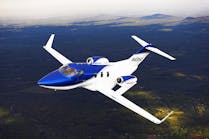 The HondaJet light aircraft seats up to five passengers in a standard configuration, and has a flight range of 1,180 nautical miles (1,357 miles.)