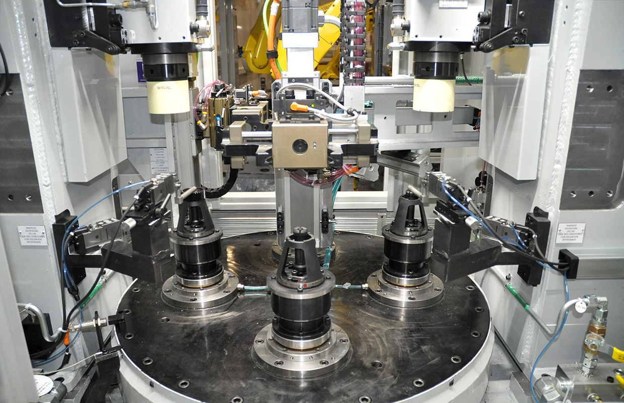 The SPV clamp bore face grinder the gear is clamped on the internal diameter of the bore and rotated in a direction opposite to that of the cup wheel at a high surface speed