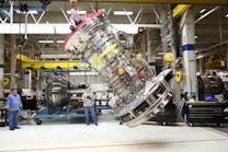 The first fully assembled GE9X engine is rotated into the horizontal assembly position at the Evendale, Ohio development assembly area.