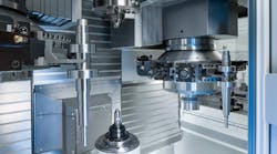 The machine is loaded and unloaded simultaneously with grippers located in the two turrets. The workpieces are transported on conveyor belts located on the left and right of the machine. The machine is loaded and unloaded simultaneously with grippers located in the two turrets. The workpieces are transported on conveyor belts located on the left and right of the machine.