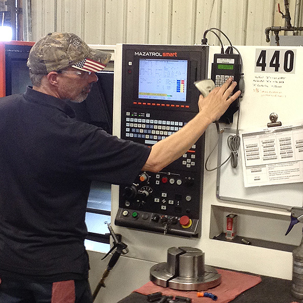 GEM Manufacturingrsquos programmer Sean Svajcsik enters a downtime reason into the eNETDNC processquality control application