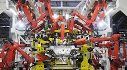 A Fiat 500 under assembly at the automaker&rsquo;s plant in Pomigliano, Italy, where more than 600 Comau SpA robots help achieve a high degree of modularity and simplify maintenance.