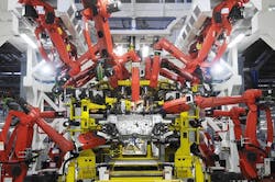 A Fiat 500 under assembly at the automakerrsquos plant in Pomigliano Italy where more than 600 Comau SpA robots help achieve a high degree of modularity and simplify maintenance A Fiat 500 under assembly at the automakerrsquos plant in Pomigliano Italy where more than 600 Comau SpA robots help achieve a high degree of modularity and simplify maintenance