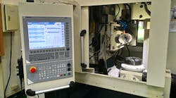 The gear hobbing machine uses a NUM FS152i operator panel, with a custom-developed HMI. The gear hobbing machine uses a NUM FS152i operator panel, with a custom-developed HMI.