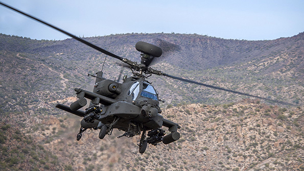 The AH64 Apache is an attack helicopter with a twinturbo shaft engine a tail wheel landing gear arrangement and a tandem cockpit for a twoman crew The ldquoErdquo variant offers improved digital connectivity and more powerful engines among other improvements