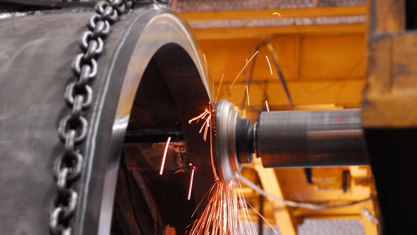 A tangential Ingersoll SMAX facemill cuts through a transmission box for large construction equipment built by Terex The switch to tangential milling doubled the operationrsquos throughput increased edge life by 5 to 1 improved finish and eliminated oilbased cutting fluid The gain freed enough machine time on one Giddings amp Lewis mill to offset the shoprsquos need for second machine