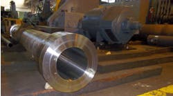 This 316 stainless steel cylinder is 144 in. long with a bore size of 8.5 in., and with a main section wall thickness of 1.5 in. The part was finish bored, honed, and machined at American Hollow Boring Co. with total indicator runout under 0.010 in. in the bore. With the bore complete, all other finished features were made according to the drawing.