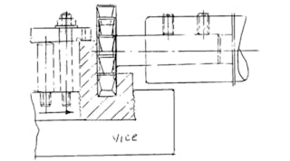 Figures 1 and 2. Show the alternative efforts to hold the workpiece vertically in a vice (Figure 1), and vertically in a vice and clamp with a bolt and nut (Figure 2), but both efforts resulted in the same poor quality finish.