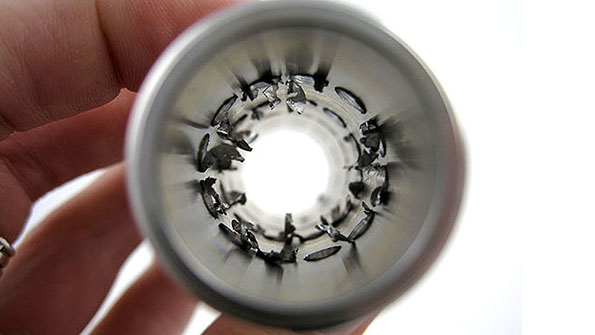 Crossdrilled holes act as conduits for fluids lubricants and gases Failing to remove burrs can cause blockage of these critical passages or create turbulence in the flow