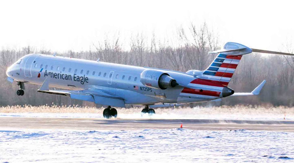 A Bombardier CRJ900 aircraft in the livery of PSA Airlines&rsquo; American Eagle brand.