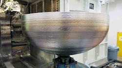 The titanium dome for a satellite fuel tank, produced via additive manufacturing. The titanium dome for a satellite fuel tank, produced via additive manufacturing.