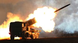 The HIMARS package includes a launcher loader module and fire control system mounted on a five-ton truck chassis.