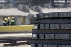 steel billets stacked steel billets stacked