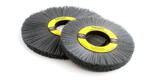 Nylon wheel brushes have flexible abrasive filaments bonded to a fiber reinforced thermoplastic base. The abrasive filaments work like flexible files, conforming to part contours, wiping and filing across part edges and surfaces to deliver maximum burr-removal rates.