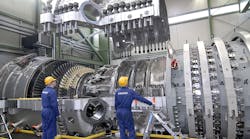 A Siemens SGT5-8000H gas turbine during final assembly. Siemens Energy produces gas turbines with capacities up to 400 MW; steam turbines up to 1,900 MW, and generators up to 2,235 MVA.