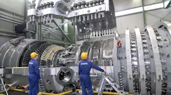 A Siemens SGT5-8000H gas turbine during final assembly. Siemens Energy produces gas turbines with capacities up to 400 MW; steam turbines up to 1,900 MW, and generators up to 2,235 MVA.
