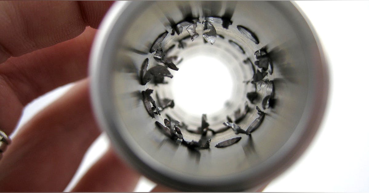 Cross hole online deburring