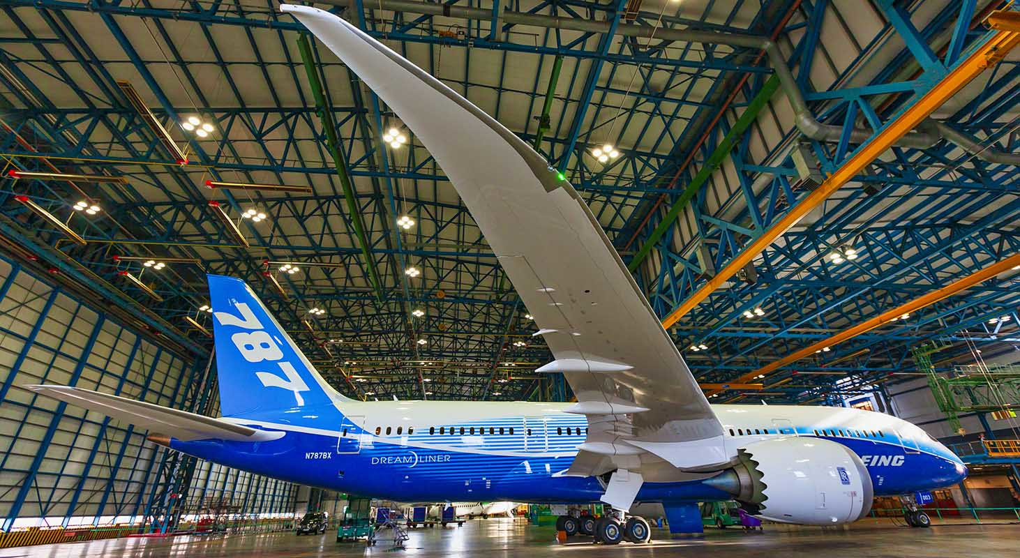 Boeing 787 Dreamliner in hangar.