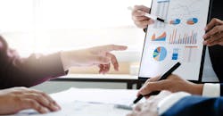 Marketing consultants at work. Marketing consultants at work.