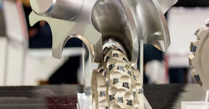 Hob cutter making a spiral, helical gear wheel on a CNC machine.
