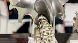 Hob cutter making a spiral, helical gear wheel on a CNC machine.