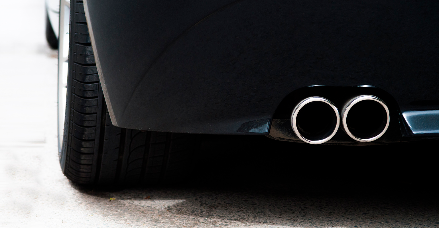 Dual tailpipe on a sports car.