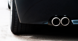 Dual tailpipe on a sports car.