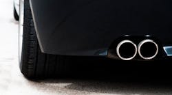 Dual tailpipe on a sports car.