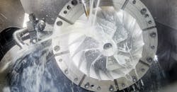 Vertical CNC milling machine in process. Vertical CNC milling machine in process.