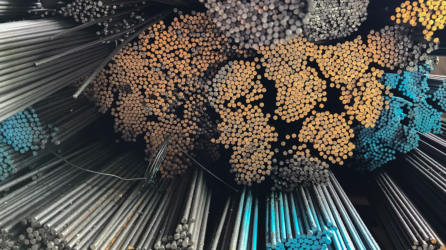 Finished steel in a warehouse.