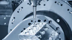 5-axis CNC milling machine cutting an aluminum V8 engine block using solid ball endmill tool.