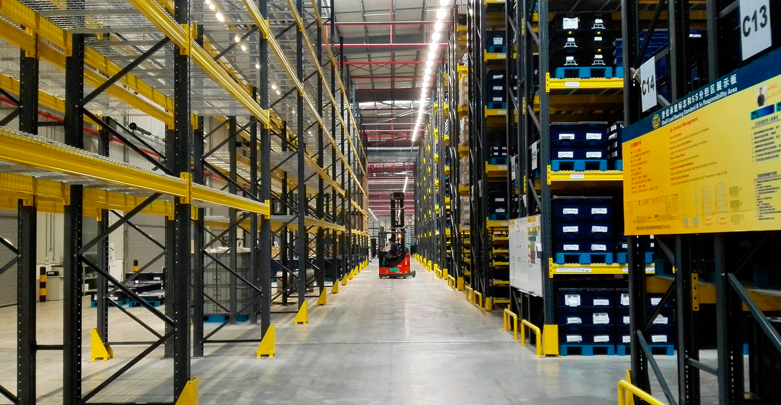 Empty warehouse shelves.