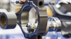Cutting tool in CNC machining operation.