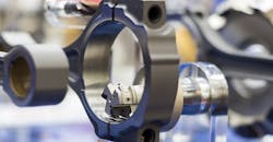 Cutting tool in CNC machining operation. Cutting tool in CNC machining operation.