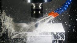 CNC milling process, with coolant. CNC milling process, with coolant.